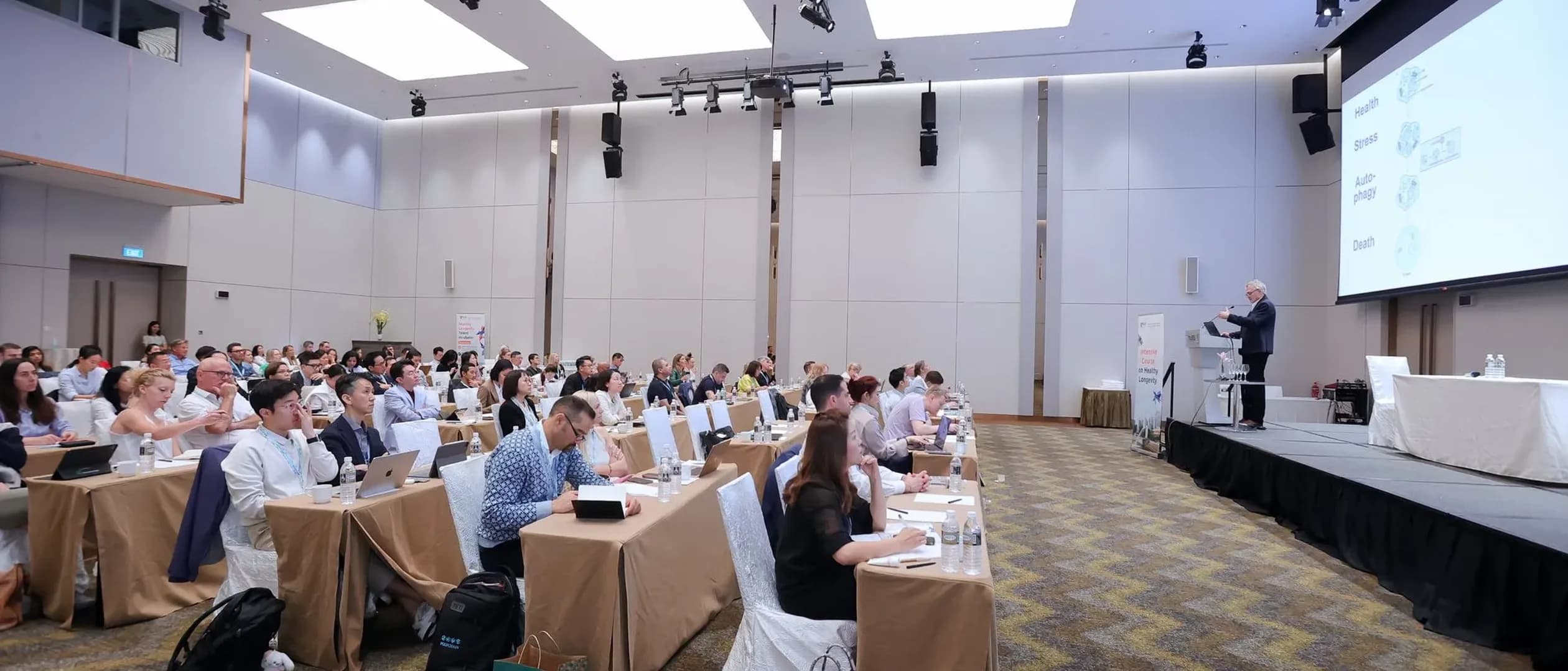 Lecture hall session at NUS's Intensive Course on Healthy Longevity launched alongside its new Healthy Longevity Graduate Certificate Singapore.