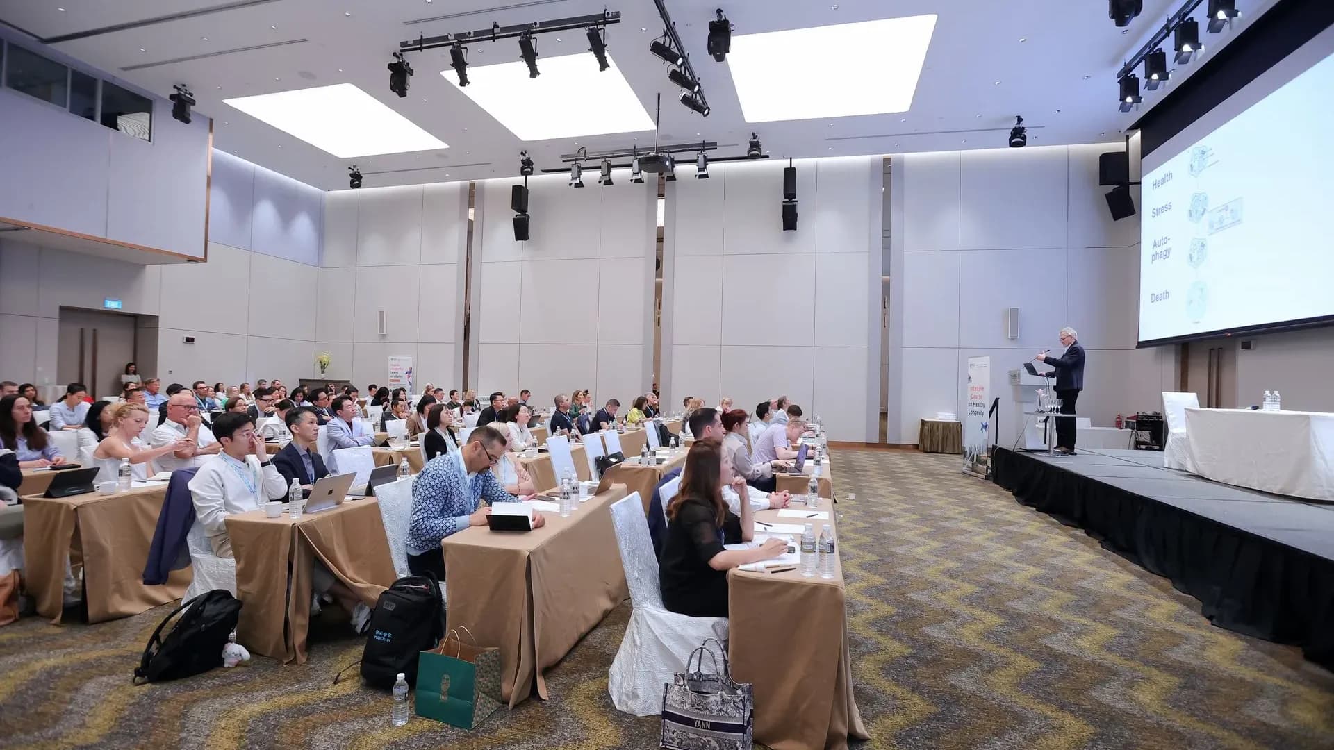 Lecture hall session at NUS's Intensive Course on Healthy Longevity launched alongside its new Healthy Longevity Graduate Certificate Singapore.